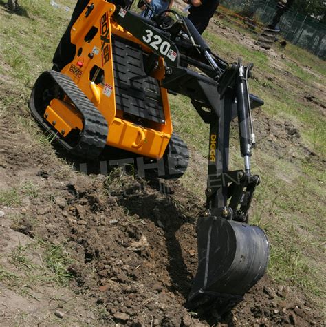 mini digger digging trench|small trench digging equipment.